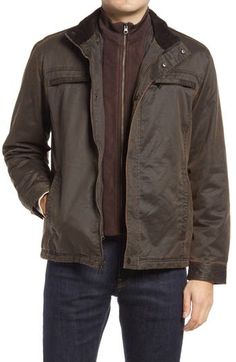 A water- and wrinkle-resistant cotton blend with a weathered look enriches a ruggedly handsome jacket with indelible appeal. Front zip closure with snap storm placket Stand collar with ribbed lining Chest zip pockets; side-seam pockets Lined, with 100% polyester fill 55% cotton, 45% polyester Dry clean Imported Men's Clothing Rugged Fall Outerwear With Zip Fly, Rugged Fall Outerwear With Zipper Closure, Rugged Outerwear With Zipper For Fall, Rugged Outerwear With Zipper Closure For Fall, Washed Long Sleeve Outerwear For Outdoor, Outdoor Long-sleeve Washed Outerwear, Washed Outerwear For Fall Outdoor Activities, Fall Outdoor Washed Outerwear, Brown Washed Cotton Outerwear