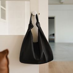 Discover Elegance and Comfort Step into the world of luxury and style with our Korean Oversized Soft Genuine Leather Hobo Shoulder Bag. Designed exclusively for the fashion-forward woman, this bag blends timeless elegance with a modern twist. The ultra-soft cowhide leather ensures a sumptuous feel, while the versatile patchwork design adds a unique touch to your everyday ensemble. Exceptional Craftsmanship Crafted from premium genuine leather, this shoulder bag promises not only style but also d Elegant Large Capacity Baguette Bag For Travel, Elegant Baguette Bag With Large Capacity For Travel, Elegant Black Hobo Shoulder Bag, Elegant Baguette Bag With Leather Handles For Shopping, Elegant Hobo Bag With Leather Handles For Office, Elegant Hobo Tote Bag For Travel, Elegant Rectangular Hobo Bag With Leather Handles, Elegant Travel Hobo Tote Bag, Modern Evening Hobo Bag With Large Capacity