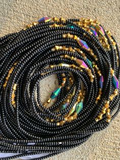 "Hi there! Thanks for your interest in these Czech waist beads. Please read below for detailed information on the listing: 🌼 This Listing is for 25, 35 and 60 strands of quality waist beads. 🌼 Length varies from 40\"- 45\" 🌼 All Beads are Tie On 🌼 You will receive almost identical beads in the pictures listed with slight variation. 🌼 All Wholesale Ship Directly from Ghana, Africa. 🌼 Retail, that is single strands ship directly from the US. 🌼 Beads are made with Strong cotton or Polyester Party Beaded Chain Necklace With Metal Beads, Party Beaded Necklace With Metal Beads, Party Metal Beaded Chain Necklaces, Faceted Round Beads For Festival, Bohemian Beaded Chain Waist Beads, Faceted Beaded Bracelets For Party, Faceted Beaded Bracelet For Party, Bohemian Beaded Waist Beads For Parties, Faceted Oval Beads For Festival