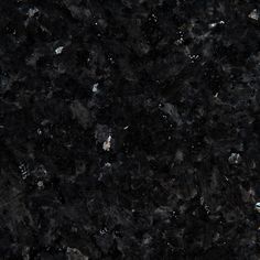 an image of black granite textured with white and grey speckles on it