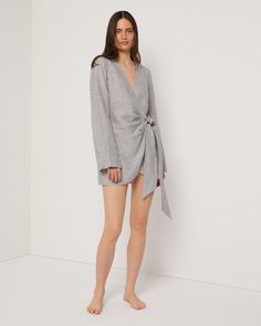 Designed in a mini crossover silhouette, this Air Linen Wrap Dress is cut from a breezy linen blend, with wide sleeves and a functional side tie. Chic Mini Wrap Dress With Tie Waist, Daywear Mini Dress With Tie Fastening, Linen Mini Dress For Daywear, Elegant Spring Mini Dress For Loungewear, Chic Wrap Dress For Brunch, Spring Linen Mini Dress For Work, Spring Loungewear Dress With Tie Waist, Spring Daywear Wrap Dress, Chic Linen Long Sleeve Mini Dress