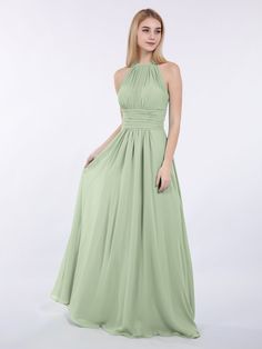 a woman in a long green dress