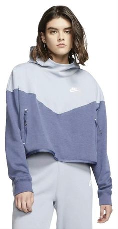 Nike Sportswear Tech Fleece Women Pullover Hoodie Blue CJ3871 464 100% Authentic, Brand New with tag Women Size: Medium Style # CJ3871 464 Product Details:   Nike Tech Fleece features a layer of insulating cotton sandwiched between knit fabric for extra warmth without extra weight or bulk. High-contrast blocks of color on select colorways give you bold, eye-catching style. Classic chevron design lines are the inspired by the classic Windrunner jacket. Scuba hood provides extra coverage and ribbe Sports Athleisure Hoodie With Pockets, Sports Hoodie With Pockets And Crew Neck, Athleisure Sports Hoodie With Pockets, Sportswear Tops With Pockets For Sports, Technical Long Sleeve Hoodie For Sports Season, Sports Hoodie With Funnel Neck And Ribbed Cuffs, Sports Sweatshirt With Kangaroo Pocket, Blue Sportswear Sweats For Fall, Hooded Sports Sweats With Pockets