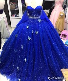 Princess Blue Dress With Sweetheart Neckline, Blue Princess Ball Gown With Sweetheart Neckline, Princess Style Blue Ball Gown With Sweetheart Neckline, Princess Blue Ball Gown With Sweetheart Neckline, Blue Embellished Ball Gown For Prom Season, Blue Embellished Ball Gown For Prom, Embellished Blue Ball Gown For Prom, Blue Embellished Fitted Ball Gown, Blue Tulle Dress For Sweet 16