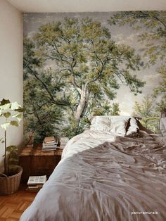 a bedroom with a large mural on the wall