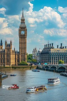 the big ben clock tower towering over the city of london, england as seen from across the river