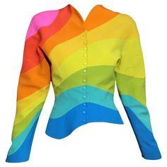 Own a true piece of wearable art and history! Ultra rare museum worthy Thierry Mugler jacket from the Spring Summer 1990 Collection. "Arc En Ciel” (Rainbow) in brushed woolen canvas with large multicolored waves. Features a fitted cut with shoulder pads and long sleeves, small v neckline with snap button closures in the same colors of the rainbow, shoulder pads, oblique hem cut, and it is fully lined. As seen on Linda Evangelista on the runway, and a variation of the jacket was on display at the Mugler Blazer, Ralph Rucci, Italian Shirts, Structured Jacket, Faux Leather Top, Asymmetric Jacket, Houndstooth Jacket, Peplum Styling, Yellow Skirt