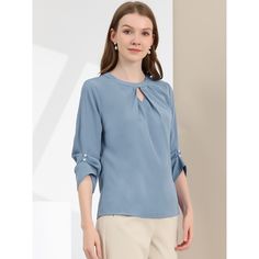 A comfy solid-color shirt is updated with perfectly pleated 3/4 sleeves for understated charm. Made of soft Chiffon fabric, this button-closure blouse with keyhole back detailing is designed for easy-to-wear, and ensures you stay comfy all day long. Styled with a simple round neck with a keyhole along with delicate pleated details on the 3/4 sleeves, it brings elegant impact to your basic wardrobe. Elegant Solid Color Top With 3/4 Sleeves, Blue Pleated Sleeve Tops For Work, Solid Color Top With 3/4 Sleeves For Work, Solid Color Tops For Workwear With 3/4 Sleeves, Solid Color Workwear Tops With 3/4 Sleeves, Solid Workwear Tops With 3/4 Sleeves, Elegant Blue Blouse With 3/4 Sleeves, Basic Wardrobe, Sleeve Packaging