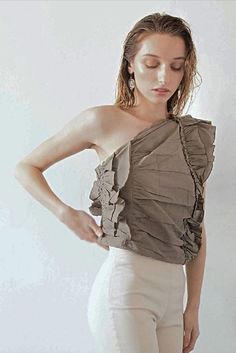 Unique upcycled top with draped effect. It features large gathered ruffles with overlocked edges and concealed zip closure on the side. | NOT JUST A LABEL stands for authentic luxury, fine craftsmanship and innovative design. Discover more emerging luxury fashion and shop thousands of personalized and tailor-made designs directly from the world's most exciting couture talent. Top With Ruffles, One Shoulder Top, One Shoulder Tops, Made In France, One Shoulder Blouse, Soft Fabrics, Ruffles, Lace Top, One Shoulder