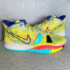 Nike Kyrie 7 Copa Men's Basketball Shoes, "1 World 1 People" New Without Tags Colorway Yellow Strike/Green Abyss/Bright Crimson/Black Product Description The Lining Of The Nike Kyrie 7 1 World 1 People Yellow Is A Bright Purple Or Indigo. This Brightly Colored Model Features A Textured Sole Made Out Of Teal, Yellow, And Black. The Body Of The Shoe Has An Abstract Print That Is Covered In Yellow Mesh. The Outline Of The Famous Nike Swoosh Symbol Appears In Thick Black Plastic. This Same Purple Is Kyrie 7, Shoes Yellow, Model Features, Teal Yellow, Nike Kyrie, Bright Purple, Nike Swoosh, Yellow And Black, Mens Basketball