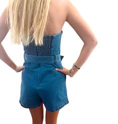 Introducing the Josie Denim Romper Embrace effortless style with the Josie Denim Romper, the ultimate choice for your summer adventures. This chic strapless design features a flattering belted waist that accentuates your silhouette, making it a must-have piece for any fashion-forward wardrobe. Key Features: Strapless Style: Stay cool and stylish during warm summer days. Belted Design: Highlights your waist for a tailored look. Durable Denim Fabric: Made to withstand all your summer escapades whi Summer Denim Blue Strapless Jumpsuit, Summer Fitted Denim Blue Strapless Jumpsuit, Fitted Denim Blue Strapless Jumpsuit For Summer, Summer Denim Fitted Strapless Jumpsuit, Medium Wash Fitted Strapless Jumpsuit Casual, Casual Fitted Medium Wash Strapless Jumpsuit, Casual Fitted Strapless Jumpsuit Medium Wash, Casual Medium Wash Fitted Strapless Jumpsuit, Belted Medium Wash Bottoms For Summer