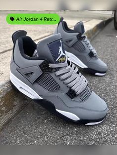 The Air Jordan 4 “Cool Grey” is the 2019 retro of the classic colorway. Originally released in 2004 as one of the first non-original colorways of the iconic Air Jordan 4, the “Cool Grey” edition became a rare and coveted sneaker throughout the years. Jordan collectors welcomed it back in 2019 with open arms. This 2019 version features the exact same look as the original release, constructed with a grey nubuck upper with black accents and a white midsole. Hits of yellow are found on the “Flight” logo on the tongue, the “Air Jordan” patch on the inside of the tongue, the visible Air unit, and outsole accents. Chrome Jumpman logos on each heel complete the classic look. Jordan 4 Retro Cool Grey, Jordan 4 Cool Grey, Flight Logo, Nike Shoes (men), Jumpman Logo, Air Jordan Sneakers, Jordan 4 Retro, Air Jordan 4, Open Arms