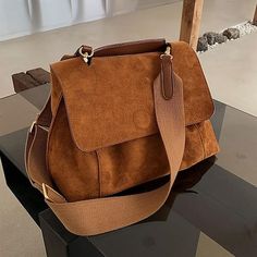 Category:Shoulder Bag,Crossbody Bag; Embellishment:Buckle; Gender:Women's; Type:Messenger Bag; Occasion:Holiday,Daily; Material:Faux Suede; Width:80; Height:19; Function:Large Capacity,Adjustable,Durable,Anti-Shock,Anti-Dust; Pattern:Solid Color; Listing Date:07/04/2023; Production mode:External procurement; Length:29 Brown Travel Satchel, Travel Crossbody Satchel In Solid Color, Handheld Satchel For Travel In Solid Color, Bags With Detachable Strap For Fall, Solid Color Bags With Detachable Strap For Fall, Elegant Brown Suede Satchel, Trendy Brown Bag, Handheld Solid Color Satchel For Travel, Brown Satchel For Errands With Single Shoulder Strap