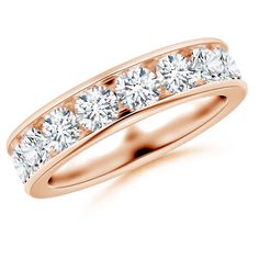 a rose gold wedding ring with five stones on the side and two rows of diamonds