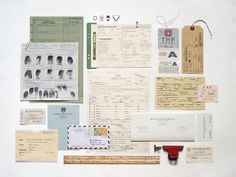 an assortment of mail, envelopes and other items