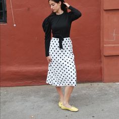 Polka Dot Midi Slip Skirt Polka Dot Relaxed Midi Skirt, Chic Polka Dot Skirt For Spring, Spring Chic Polka Dot Skirt, Chic Long Skirt With Polka Dot, Black Midi Skirt For Brunch, Chic Polka Dot Relaxed Fit Skirt, Chic Polka Dot Relaxed Skirt, Chic Polka Dot Skirt Relaxed Fit, Chic Polka Dot Skirt