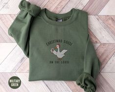 Silly Goose Embroidered Christmas Sweatshirt, Holiday Sweater, Funny Goose Lover Gift,Xmas Goose Crewneck,Christmas Lights Santa Goose Shirt 🪡 PRODUCTION TIME: - 1-3 days 📦 SHIPPING TIME: - 2-5 days 📏SIZING: Please keep in mind this item is UNISEX and designed to be a relaxed fit. - Refer to the size chart on the listing photos for a detailed sizing chart with measurements. - If you are seeking an oversize look be sure to order 1 to 2 sizes up from your regular size- refer to the size compari Ghost Girl, Dog Custom, Holiday Sweater, Fall Sweatshirt, Halloween Sweatshirt, Fete Halloween, Embroidered Sweatshirts, Cute Ghost, Look Plus