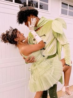 a man and woman dressed up as peter panton and princess pocahone