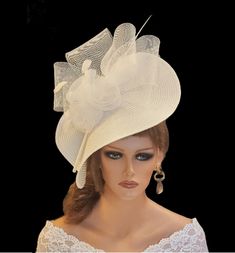 Large White & Ivory Hat Fascinator with long Quill Feather, Crinoline Roses and bows perrfect for Mother of Bride or Goom, Royal Ascot, Kentucky Derby, Weddings Goodwood revival, Christening, Ascot or any special occasion. Gorgeous White straw weave Hat fascinator long quill feather  Crinoline  Roses and featherd flowers This hat has been made by hand and very light to wear 38cm (15 inches) Saucer hat This hat is designed to be worn tilted on the side of the head with  long Quill feathers and Fe Wedding Hats For Bride, Mummy Dress, Race Wedding, Saucer Hat, Ascot Horse Racing, Ivory Hat, Church Lady Hats, White Fascinator, Royal Ascot Hats