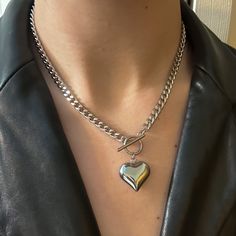 "The Chunky Heart Toggle Necklace in Silver ✨ Solid Stainless Steel & Tarnish Proof! Featuring a puffed heart pendant paired with a chunky cuban link link chain and front toggle for easy removal 🤍 Approx. 17\" in length  Handmade with love! Unisex ✨" Chunky Heart Pendant Necklace As Gift, Chunky Pendant Necklace, Heart Chain Necklace, Heart Necklace Silver, Chunky Heart Necklace, Metal Heart Toggle Necklace With Heart Charm, Trendy Silver Heart Necklace With Chunky Chain, Chunky Heart-shaped Jewelry Gift, Metal Toggle Necklace With Heart Charm