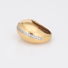 Rare vintage Tiffany & Co diamond dome ring designed by Paloma Picasso, crafted in 18 karat yellow gold & platinum (circa 1980).    33 round brilliant & single cut diamonds total an estimated 0.33 carats (estimated at G-H colour and VS2-SI1 clarity).  Dating to 1980 the 18k gold dome ring, with a central strand of diamonds, is designed by Paloma Picasso for Tiffany & Co, the same year she started her design work at Tiffany (and continues today). Paloma Picasso has a love of big gemstones and bol Yellow Gold Oval Dome Ring With Pave Setting, Classic Yellow Gold Domed Diamond Ring, Fine Jewelry Oval Dome Ring With Single Cut Diamonds, Timeless Gold Dome Ring With Diamond, Oval Dome Ring With Single Cut Diamonds Fine Jewelry, Gold Diamond Dome Ring With Brilliant Cut, Oval Yellow Gold Diamond Dome Ring, Timeless Gold Domed Diamond Ring, Timeless Domed Gold Diamond Ring