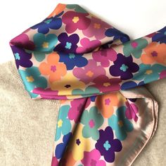 Square csatin scarf with colorful flowers. A luxury floral accessory for all kind of women. For multiple uses; as a scarf, or head cover like hijab or handbag accessory. The print is designed by me. Lenght 64 cm, wide 64 cm. For shoppers in United States and Canada: https://www.etsy.com/listing/1190403457 Other scarves in my shop: https://www.etsy.com/shop/MiracolaBottega?ref=seller-platform-mcnav&section_id=29230145 Each item will be wrapped in attractive wrapping paper and carefully send. It is ready for gift giving. If you have special wishes, please let me know.  You can follow me on Instagram and Pinterest: Pinterest: https://nl.pinterest.com/miracola2758 Instagram: @miracolabottega Multicolor Summer Shawl As Gift, Summer Multicolor Shawl As Gift, Multicolor Shawl As Summer Gift, Spring Shawl Scarves As Gift, Multicolor Shawl Scarf As A Gift, Spring Shawl Scarf As Gift, Multicolor Silk Shawl For Spring, Spring Gift Shawl Scarves, Multicolor Shawl Scarves For Spring