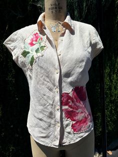 Upcycled linen blouse.  overdyed. hand sewn on large flowers  armpit to armpit 19" center back neck to hem 21" Vintage Linen Blouse For Summer, Short Sleeve Linen Blouse With Floral Embroidery, Bohemian Fitted Shirt With Buttons, Short Sleeve Linen Top With Floral Embroidery, Short Sleeve Linen Tops With Floral Embroidery, Linen Tops With Floral Embroidery And Short Sleeves, Bohemian Linen Short Sleeve Blouse, Bohemian Short Sleeve Linen Blouse, Bohemian Short-sleeve Linen Blouse