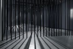 an abstract black and white photo with lines on the floor