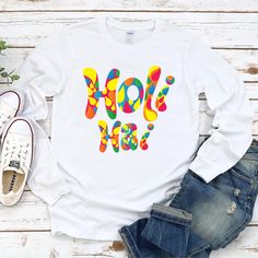 Classic Fit Happy Holi Family Long Sleeve T-Shirt, Hindu Spring Unisex Long Sleeve Shirt, Happy Holi Colors Shirt For Kids, Elephant Happy Holi Shirt. 8 Oz./Yd² (Us) 13.3 Oz./L Yd (CA), 50/50 Preshrunk Cotton/Polyester Heather Sport Colors: 60/40 Polyester/Cotton Safety Green: Compliant With ANSI / ISEA 107 Air Jet Yarn for Softer Feel and Reduced Pilling Double-Needle Stitching at Shoulders, Armholes, Neck, Waistband, and Cuffs 1x1 Rib With Spandex for Enhanced Stretch and Recovery Happy Holi Shirt Grey Pearlized Tear Away Label Happy Holi Family Long Sleeve T-Shirt, Hindu Spring Unisex Long Sleeve Shirt, Happy Holi Colors Shirt For Kids, Elephant Happy Holi Shirt. High-Quality Air Jet Yarn for Softer Feel and Reduced Pilling. Double-Needle Stitching at Shoulders, Armholes, Neck, Waistban Playful Colorful Crew Neck T-shirt, Playful Multicolor Crew Neck T-shirt, White Long Sleeve T-shirt With Funny Text, Funny White Long Sleeve Shirt, White Long Sleeve Tops With Funny Text, Fun White T-shirt For Holiday, Fun Multicolor Tops With Funny Text, Multicolor Tops With Funny Text, Fun Long Sleeve Screen Print T-shirt