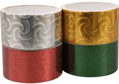 three rolls of metallic foil tape with different designs on each side and one roll in the middle