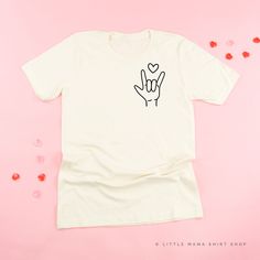 All Little Mama shirts are unisex sizing. They run slightly larger than typical women's shirts and slightly smaller than typical men's shirts. We recommend ordering your normal size for a regular fit. Please reference all size charts before purchasing. Relaxed Fit Short Sleeve Shirt With Heart Graphic, Family Brand, Mama Shirts, Sign Language, Men's Shirts, Mama Shirt, Women's Shirts, Size Charts, Shirt Shop