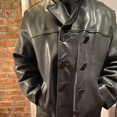 This Men’s Leather Jacket Is A Staple Of New York Fashion! This Is Quality Leather! Minor Repairs Such A New Lining On The Right Side Of The Jacket. Purchased From New York’s Infamous Delancey Street. This Jacket Is A Great “Car Coat”! Classic Leather Jacket With Pockets For Cold Weather, Classic Leather Pea Coat With Button Closure, Classic Black Leather Jacket With Double Button Closure, Casual Leather Double-breasted Outerwear, Classic Double-breasted Leather Jacket For Winter, Classic Double-breasted Winter Leather Jacket, Black Vintage Outerwear With Double Button Closure, Double-breasted Leather Outerwear With Snap Buttons, Classic Leather Pea Coat For Business