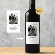 a bottle of wine with an image on the label next to it that says, save the date