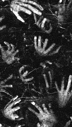 many hands are shown in black and white