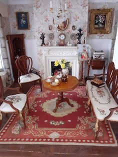 a living room filled with furniture and a fire place in the middle of a room