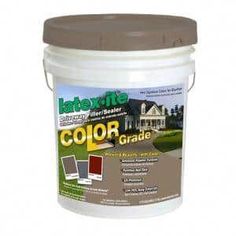 a bucket of paint with the words color grade on it and an image of a house in