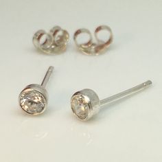 Small diamond cz stud earring.  Great for cartilage piercings.Metal: 925 Sterling SilverStone: White diamond CZSize : diameter 4mm  Other sizesLargehttps://www.etsy.com/listing/398208557Mediumhttps://www.etsy.com/listing/72270182Store home pagehttp://www.etsy.com/shop/360JewelsThanks for your interest in our men's diamond cz stud earrings. Classic Silver Piercings With Prong Setting, Classic Round Nose Studs For Gifts, Everyday Silver Cubic Zirconia Piercings, Everyday Internally Threaded Cubic Zirconia Earrings, Silver Minimalist Cubic Zirconia Piercings, Silver Minimalist Piercings With Cubic Zirconia, Silver Nose Studs With Prong Setting Gift, Classic Round Cut Piercings As Gift, Sterling Silver Piercings In Diamond White As Gift