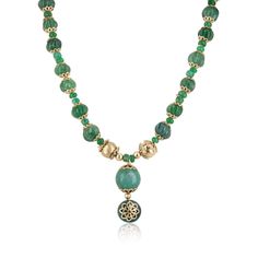 Introducing our exquisite Natural Emerald Carved Beaded Pendant Necklace. This stunning piece features a captivating array of round cabochons, rondelles, and intricately hand-carved emeralds, each meticulously crafted to create a unique and eye-catching texture. The highlight of this necklace is an earthy, breathtaking round cabochon emerald pendant, adorned with beautiful floral golden etchings, set in 14k yellow gold with silver gold plating. This pendant adds a touch of elegance and sophistic Elegant Gemstone Beads In Gold, Artisan Yellow Gold Necklaces With Natural Stones, Luxury Gemstone Beaded Necklaces For Jewelry Making, Luxury Beaded Necklaces With Round Beads, Elegant Jade Jewelry With Spacer Beads, Bohemian Gold Emerald Necklace With Round Beads, Bohemian Style Gold Emerald Necklace With Round Beads, Gold Emerald Necklaces With Gemstone Beads, Luxury Necklaces With Round Natural Stones