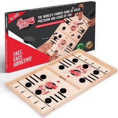 two wooden game boards with black and white numbers on them, one is holding the board