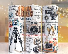 two cans with different pictures on them and a tripod in front of the can