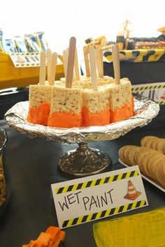 an assortment of desserts on display at a party