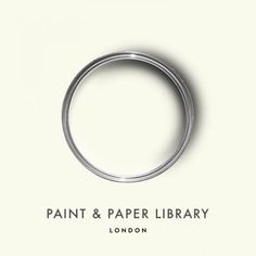 a silver ring with the words paint and paper library on it's bottom corner