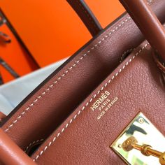 Description HRMS Birkin Bag Toile and Brown Barenia with Gold Hardware For Women, Handbags, Shoulder Bags 30cm/12in Rep 1:1 Size: 30 x 23 x 17 cm / 12 x 9 x 6.5 inches (Length x Height x Width) Hermès bags are considered the ultimate luxury item the world over. Hand stitched by skilled craftsmen, wait lists of a year or more are common. Birkin bag will retain its shape immaculately, with the same scratch-resistant qualities as popular Togo. We love the combination of gold hardware with the uplif Hermes Birkin Bag, Louis Vuitton Shirt, Chanel Shirt, Hermes Bags, Evening Clutch Bag, Hermes Birkin, Tote Backpack, Luxury Items, Birkin Bag