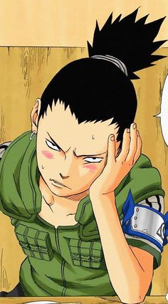 an anime character sitting at a table with his hand on his head and looking down