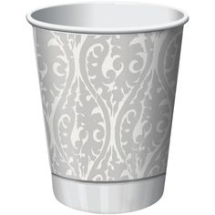 a paper cup with an ornate pattern on it