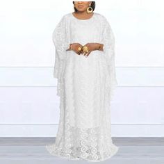 Step into timeless elegance with our MD African Lace Wedding Maxi Dress. This fashion-forward piece seamlessly combines traditional African aesthetics with contemporary style, creating a stunning outfit for your special day. The intricately designed lace adds a touch of sophistication and allure, making it a perfect choice for a sexy and memorable wedding ensemble.Designed with the modern woman in mind, this dress effortlessly fuses comfort and style. The plus-size fit ensures a flattering silho White Maxi Length Gown For Banquet, White Long Sleeve Maxi Dress For Banquet, White Floor-length Banquet Dress, White Full-length Banquet Dress, Lace Maxi Dress For Wedding Night, White Full Length Party Dress, Elegant White Floor-length Maxi Dress For Banquet, Long Sleeve Lace Dress For Wedding Night, White Full-length Lace Dress