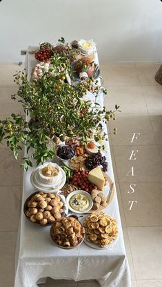 a long table filled with lots of food