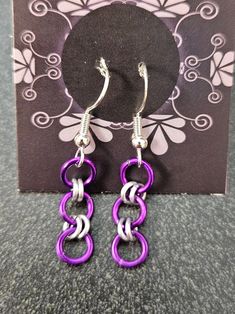 These earrings are hand crafted and made to order with each customers expectations in mind. Any alterations we are happy to attempt to accommodate upon request. Anything from color to length we are happy to exchange although length is subject to small price changes depending on how much bigger/smaller the earrings get. * Anodized Aluminum Rings * Hypo Allergenic Earring Hooks Handmade Purple Metal Earrings, Anodized Aluminum, Earring Hooks, Jewelry Earrings Dangle, Etsy Earrings, Dangle Drop Earrings, Hand Crafted, Dangle Earrings, Jewelry Earrings