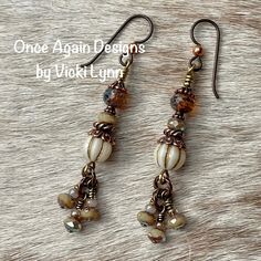 “Cashmere Glow” - Dangle Earrings Hand Created - Once Again Designs By Vicki Lynn These Limited Edition Earrings Feature An Array Of Stunning Czech Glass Beads In Creams And Browns. Small Dangles Have A Warm Iridescent Glow. Copper Findings Enhance The Look. Can Be Worn For Casual Events Or For A Night Out. This Pair: - Czech Glass Rondelles, Rounds, And Faceted Beads. - Tierracast Copper Bead Caps And Finding. - Tierracast Quality Niobium Hypoallergenic French Hook Ear Wires With Delicate Coppe Vintage Accessories Jewelry, Czech Beads Jewelry, Copper Earrings Handmade, Earthy Earrings, Vintage Jewelry Repurposed, Earring Inspiration, Earrings Beads, Diy Jewelry Earrings