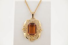 "Crafted in 14ct Yellow Gold  Set with Madeira Citrine  Stone (Vintage)  Size 3.4cm x  1.7cm x 1.2cm  Chain added recently 22\"  Both items have recently  hallmarked at the Assay Edinburgh  Excellent Condition" Art Deco Yellow Gold Locket Necklace, Antique Gold Citrine Jewelry, Antique Citrine Gold Jewelry, Oval Citrine Antique Jewelry, Victorian Gold Citrine Jewelry, Victorian Style Gold Citrine Jewelry, Victorian Citrine Gold Jewelry, Antique 14k Gold Necklaces For Formal Occasions, Art Deco Locket Necklace For Formal Occasions